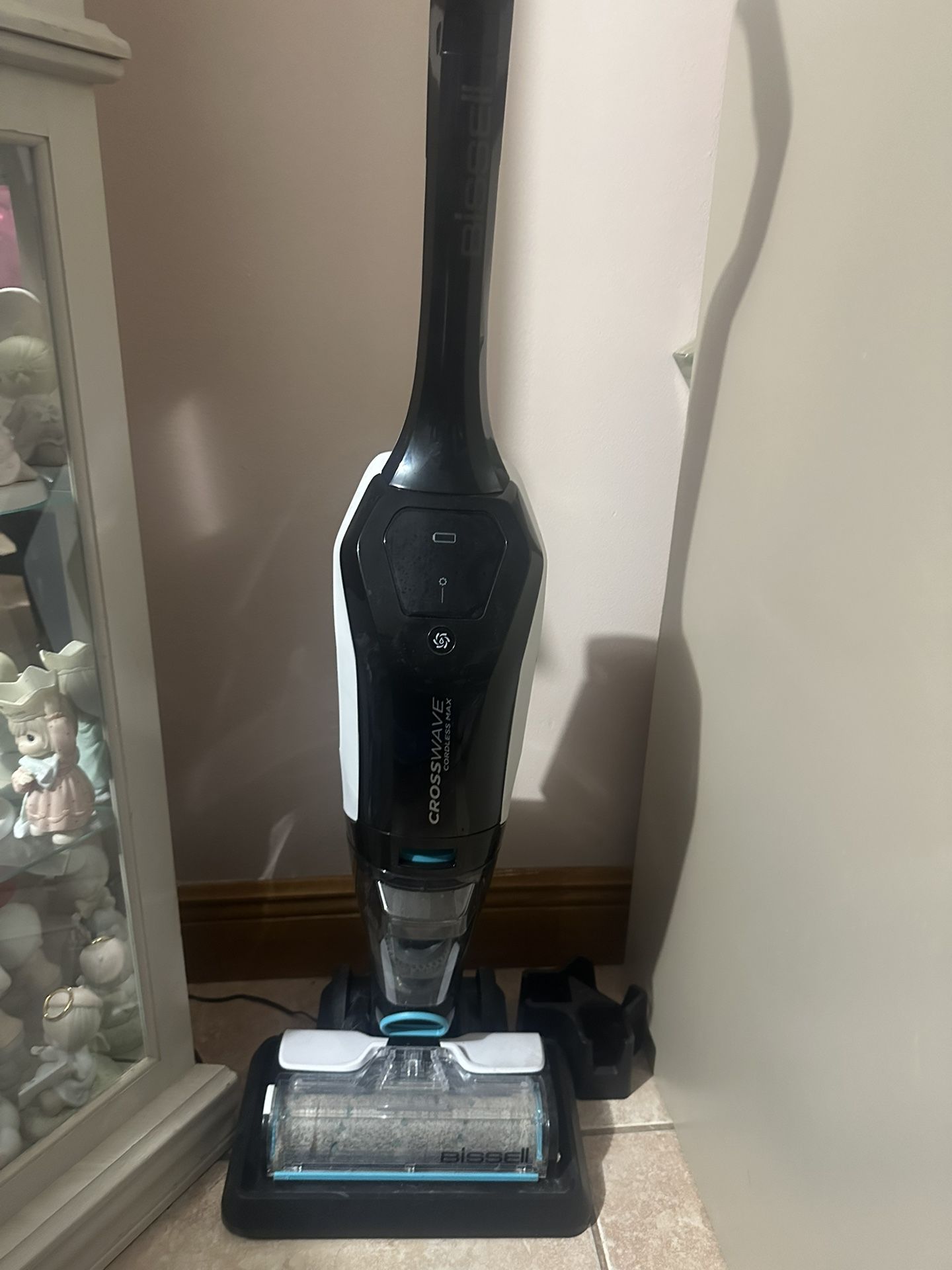 Almost new Bissell CrossWave Cordless Vacuum/Mop and liquid cartridges