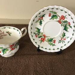 “A Cup Of Christmas Tea” (based  on the book) ) Saucer + Cup 1992 Bone China Holly Graphics 