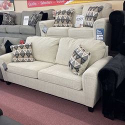 Ashley Furniture Blowout Sale Brand New Sofa Loveseat W Designer Accent Pillows Included 50 Down Takes It Home Today for Sale in Newport News VA