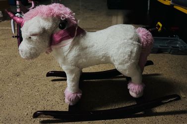 Pink unicorn rocking horse