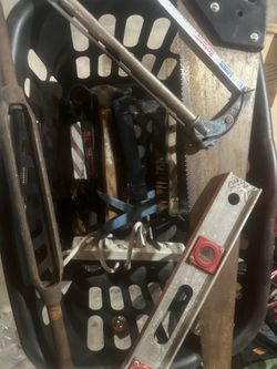 Box of tools, saw level etc