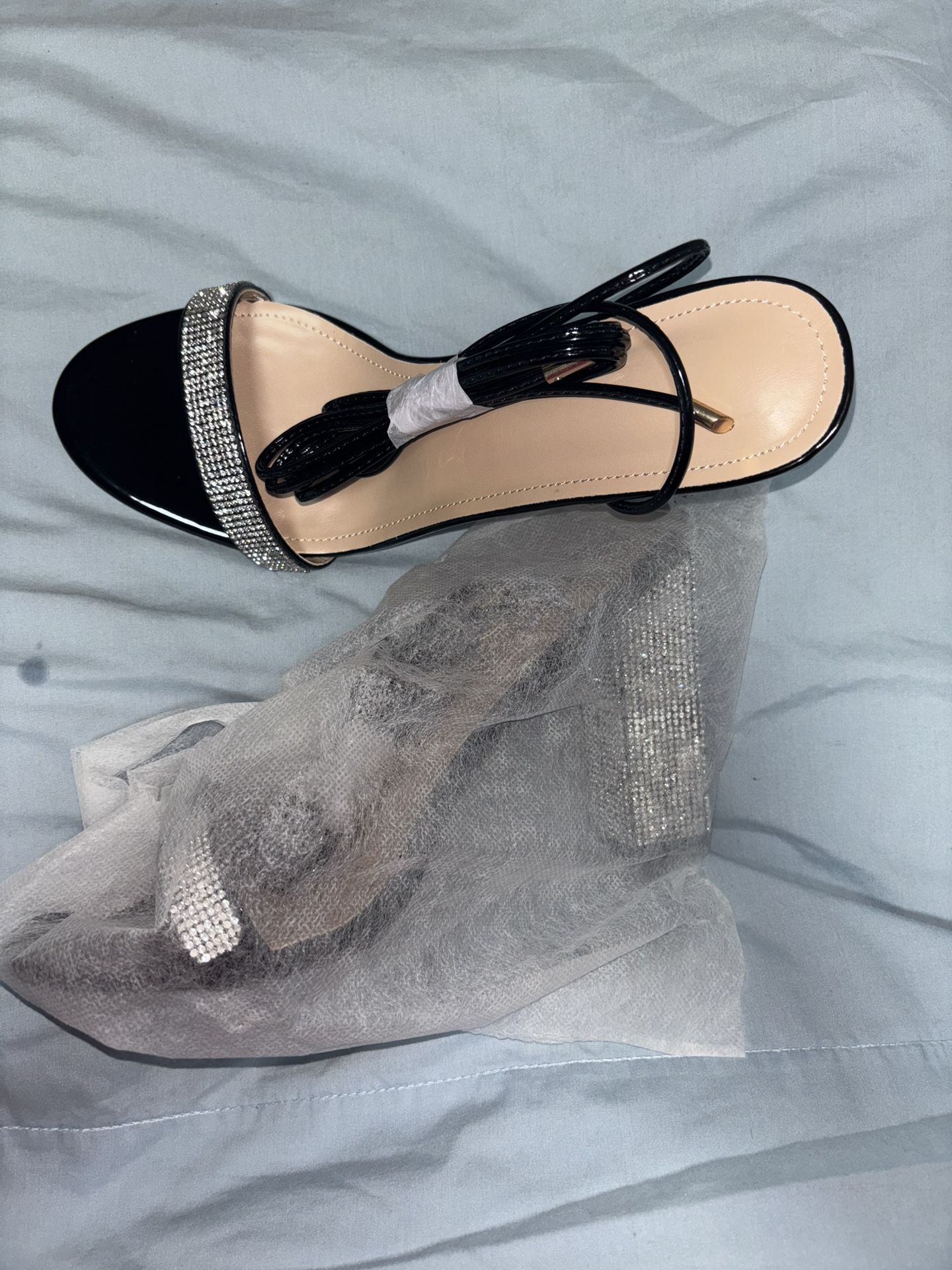 Black High Heels with rhinestones.