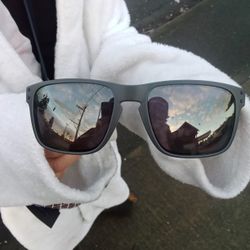 Grey Oakley Sunglasses