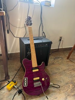 Ernie ball MM1 OLP electric guitar with amp and distortion pedal