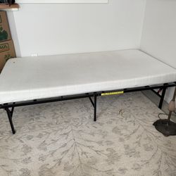 Two Twin Folding Bed frames And IKEA Mattresses