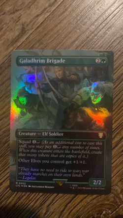Galadhrim Brigade foil borderless card from the Lord of the Rings Magic: The Gathering set.