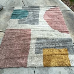 8x10 Balta “Tibet” wool area rug with a modern geometric design and thick, plush pile. High-quality construction, OEKO-TEX certified, and in great con