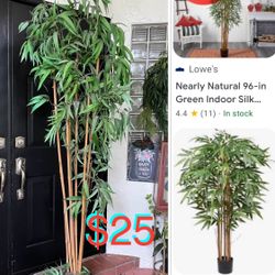 $25 Tall Bamboo artificial Plant about 7 feet tall being used in my front door