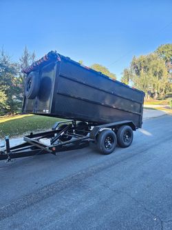 BRAND NEW DESIGN DUMP TRAILER 12x8x4 12,000 LBS ROLLING TARP AND SPARE TIRE HYDRAULIC SYSTEM ELECTRIC BRAKES TITLE IN HAND FOR ANY QUESTION TEXT ME PL