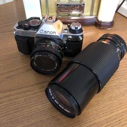 Camera 📷 Canon, AE-1 with 2 canon lens as in pictures.  In excellent, perfect condition👍🏻