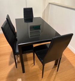 Black Dining Table and Four Chairs