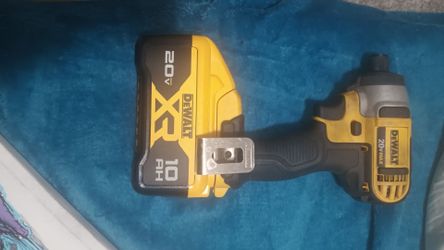 DeWalt 20 v max impact driver with battery and charger.