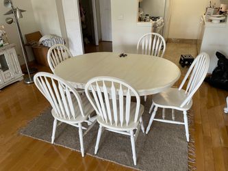 Wood table with 6 chairs.