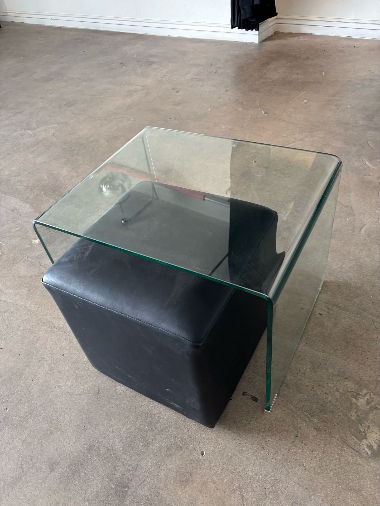 Glass table and blk ottoman