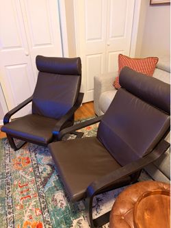 Two POÄNG armchairs