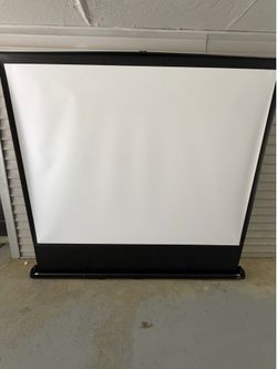 Da-Lite Deluxe Insta-Theater Floor rising projector screen. Home theater screen, business projector screen.