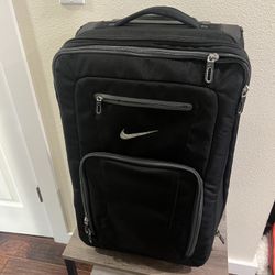 Pair Of Nike Rolling Bags