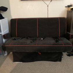 Chevy van Sofa Bed With Seat Belts and Lever to Lay Flat. 