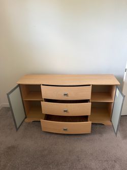 Light Wood Dresser with Glass Cabinet Doors