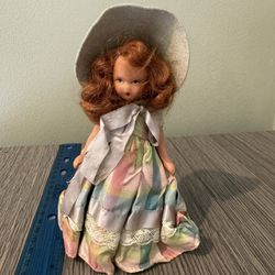 Vintage Pastel Patchwork Porcelain Doll with Elegant Hat -