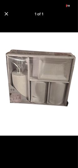 Four piece bathroom accessories set
