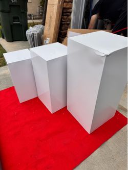 Selling 3 Square Pedestal stands 29” tall. 25” tall and 21” tall- good condition total price $60