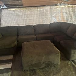 Brown sectional with ottoman good condition clean we sell all the time delivery extra for local