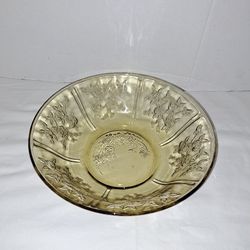 Beautiful vintage yellow glass serving bowl with rose pattern.