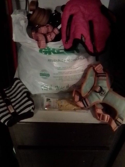 LG bag of Sm. dog harnesses and outfits 