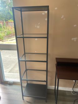 IKEA glass and metal shelving unit