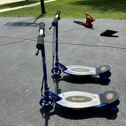 Two Razor E95 electric scooters