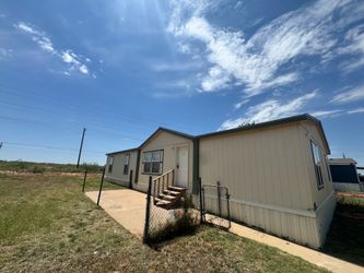 Solitaire 4/2 doublewide textured mobile home at Airline Mobile Home Park
