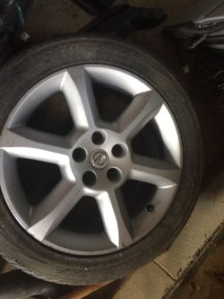 04-06 nissan maxima 6 spoke alloy wheel