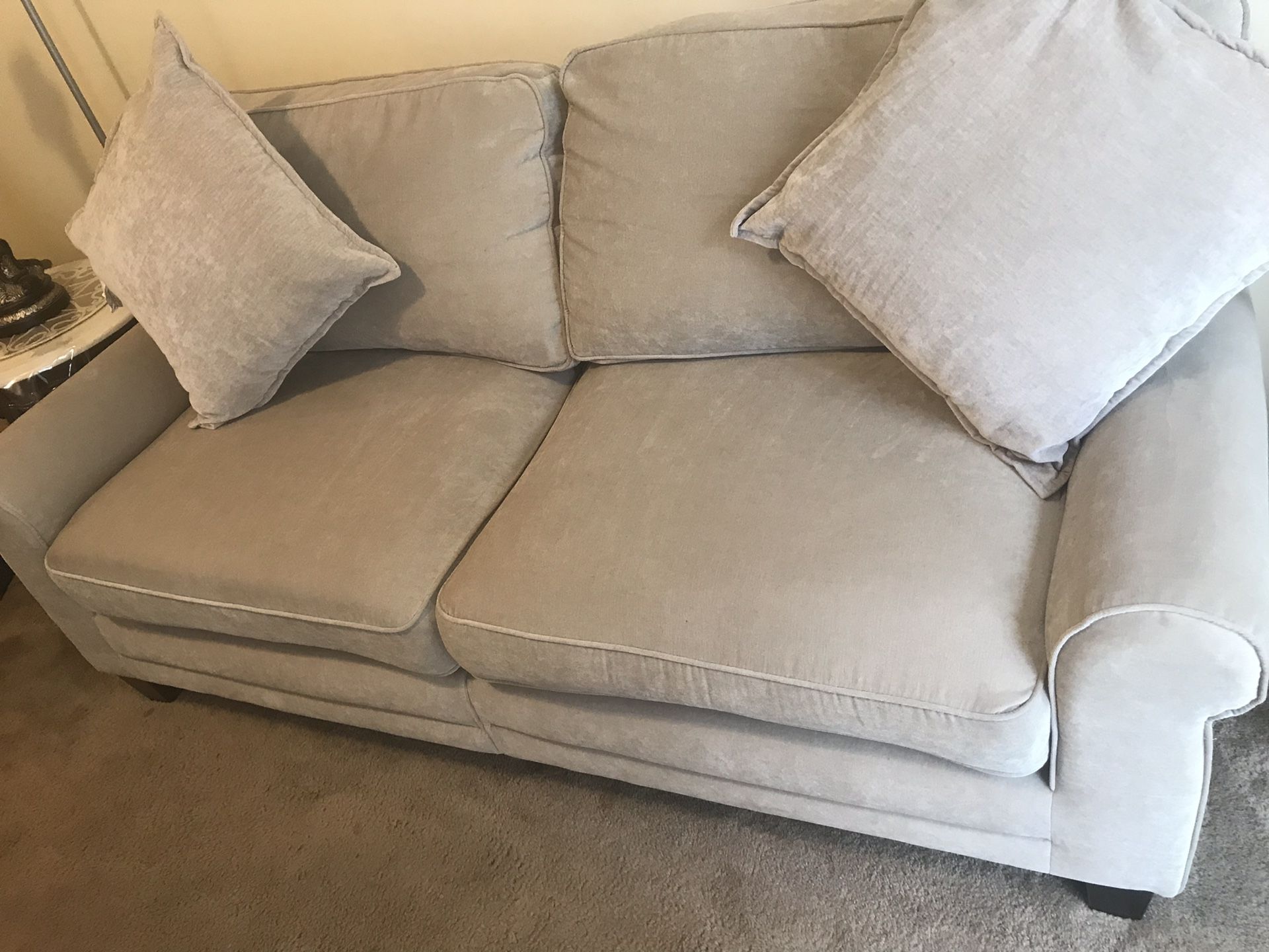 Ivory sofa with 2 pillows like new smoke pet kids free home always covered pick up in Gaithersburg md 20877