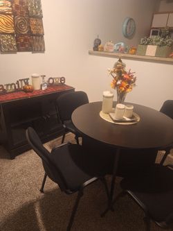 Table and four chairs