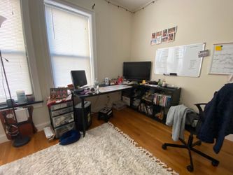 IKEA L-shaped desk with attached shelf