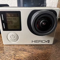Go Pro Hero 4 With New Remote And Accessories 