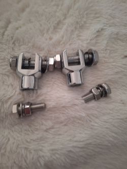 Brackets for highway pegs