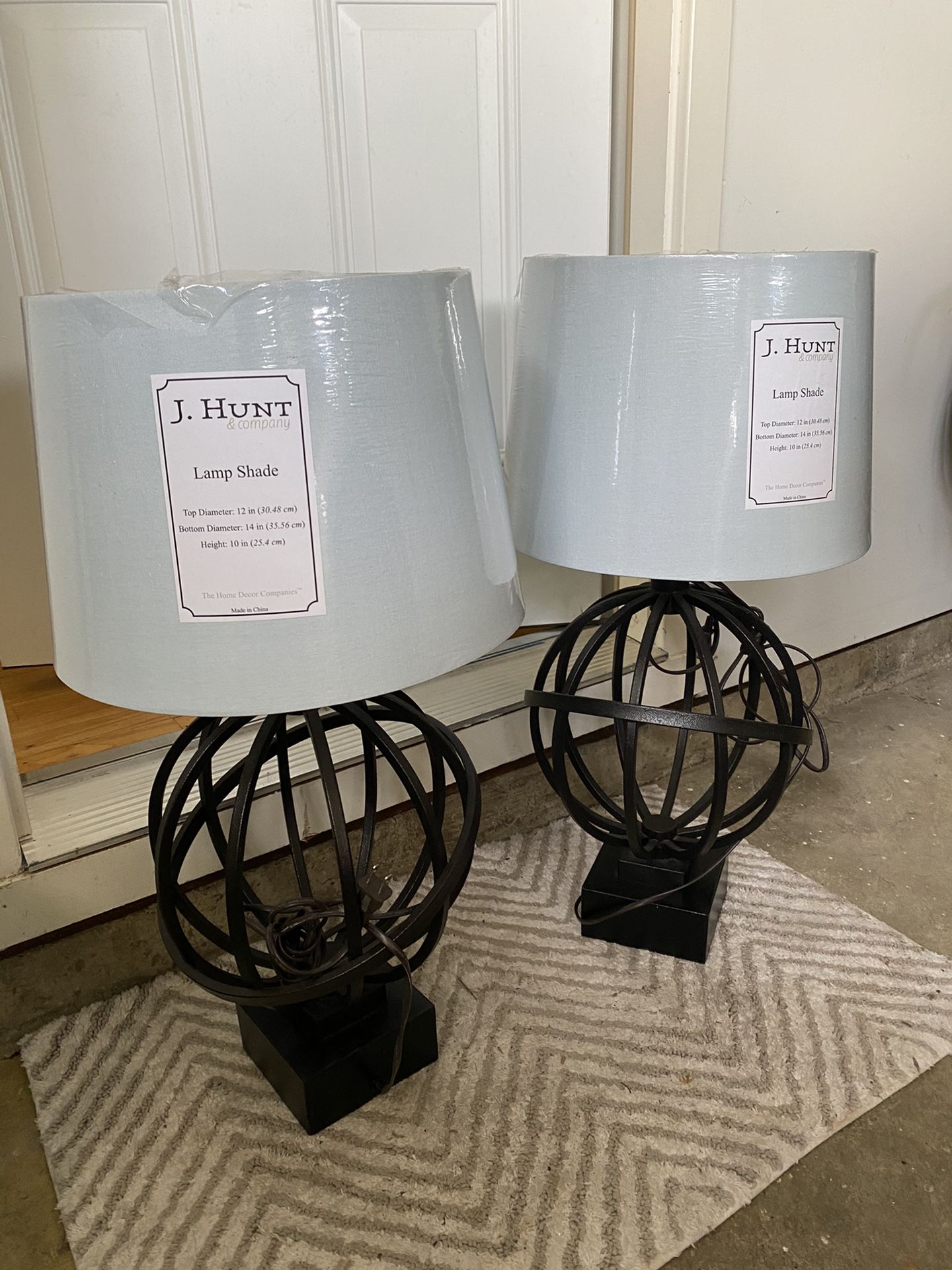 two living room lamps. Very good condition with plastic still on