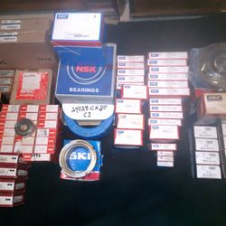 SKF, NSK, MRC, and Timken bearings. One SKF Bearing Sleeve, Two Dodge 4 15/16 SLV AUX Seal Kit