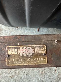vintage K.O. Lee valve seat cutter set.The set includes various specialized cutters, pilots, and holders designed for engine valve repair.