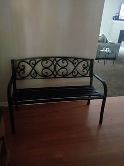 Black Metal Bench with Scroll Design