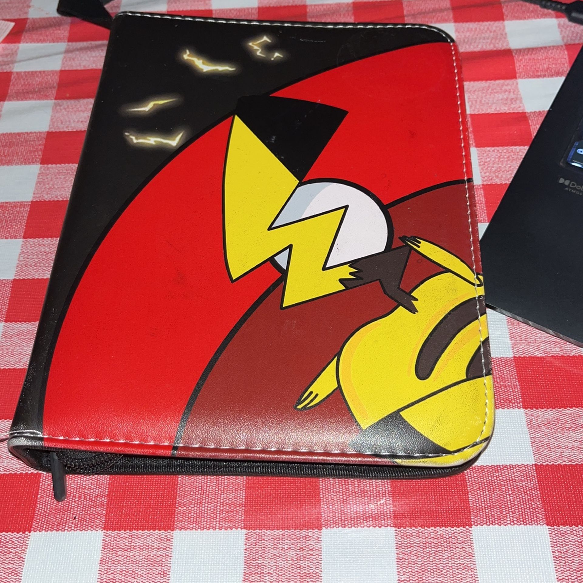 Pokémon Binder With A Lot Of Cards In It