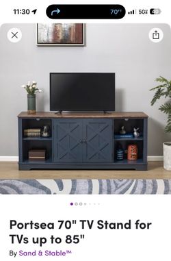 70 inch tv stand navy and with a wood top.