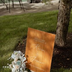 Artificial flowers for wedding sign