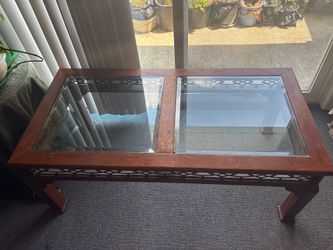 Elegant glass top coffee table