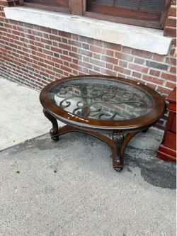 Oval Wood and Glass Coffee Table with Wrought Iron Inlay
