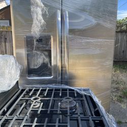 Refrigerator And Maytag Gas Range 