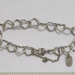 James Avery Connected Hearts charm bracelet in sterling silver. 