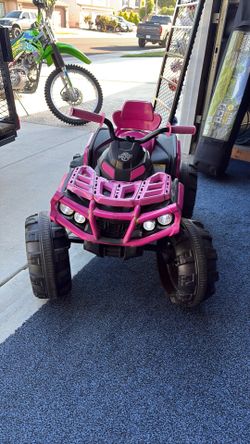 Kids ride on quad